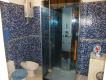 Badezimmer mit Duschtempel